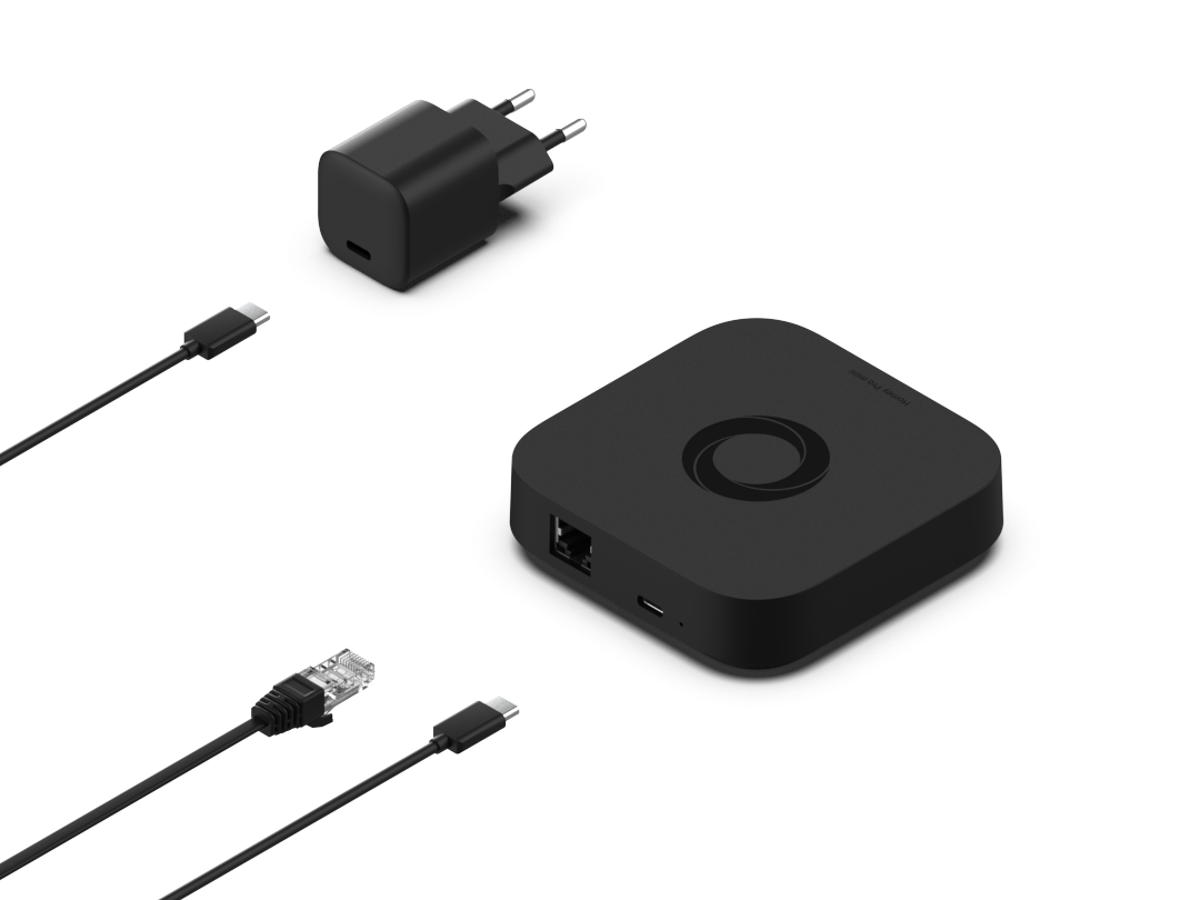 An illustration of a Homey Pro mini device next to an ethernet cable, USB-C cable, and power adapter